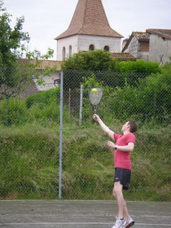 Playing tennis nearby